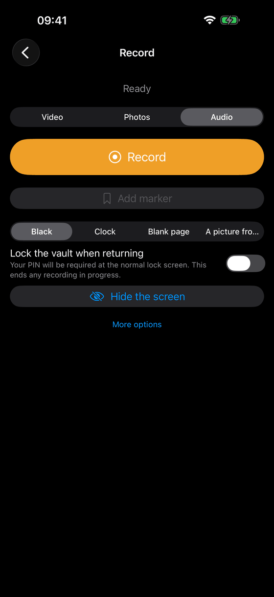 The recording screen with a Video, Photos and Audio selector, a large record button and a button that hides the screen.